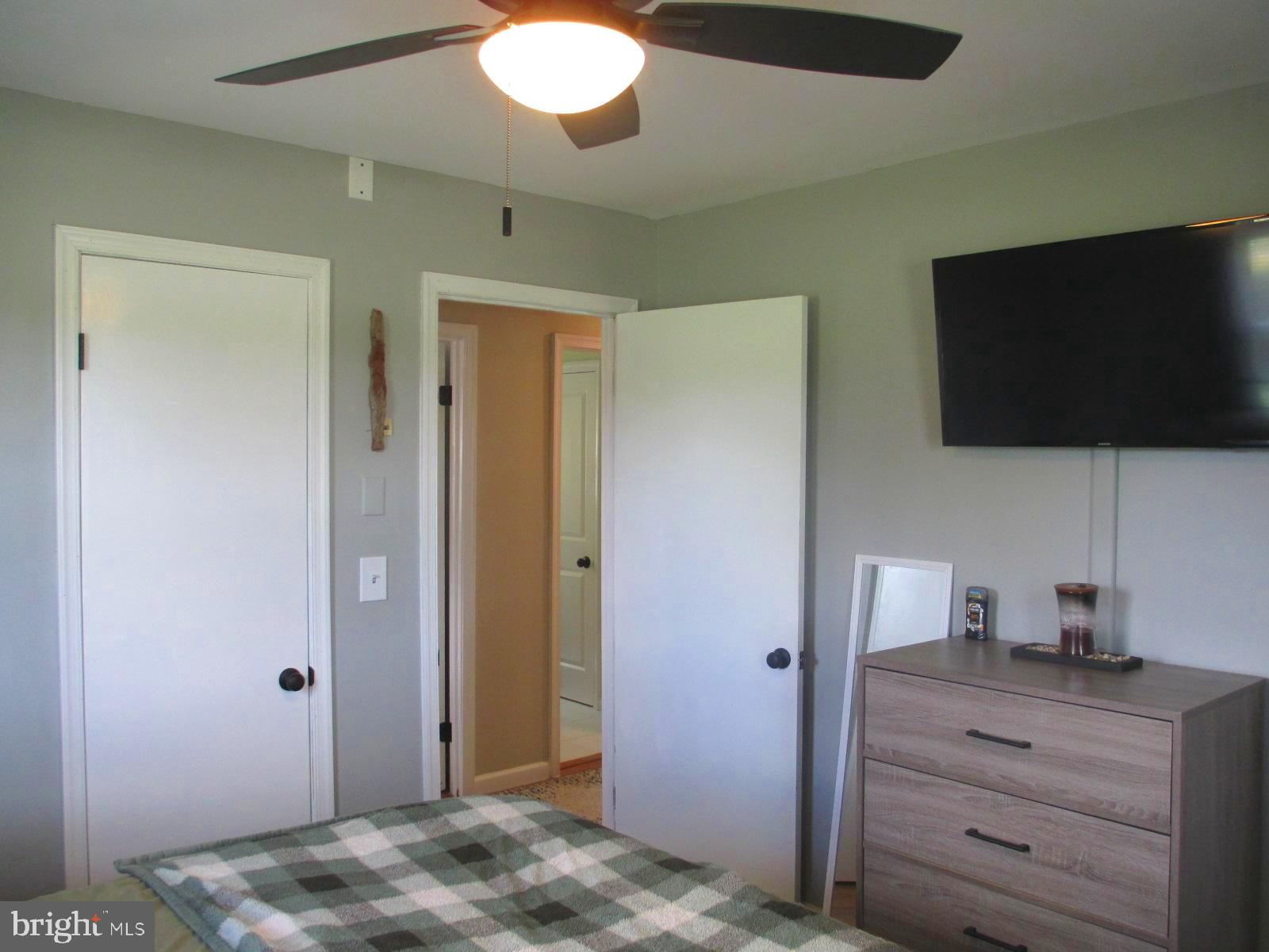 25241 Porters Grove Road Worton, MD 21678 - Photo 19 of 22 a view of a livingroom with a flat screen tv