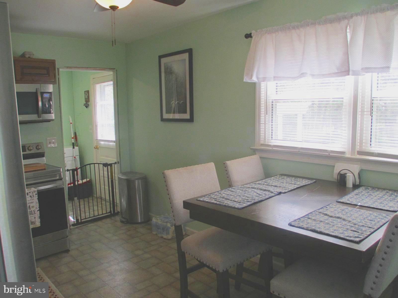 25241 Porters Grove Road Worton, MD 21678 - Photo 9 of 22 a bedroom with a bed and a window