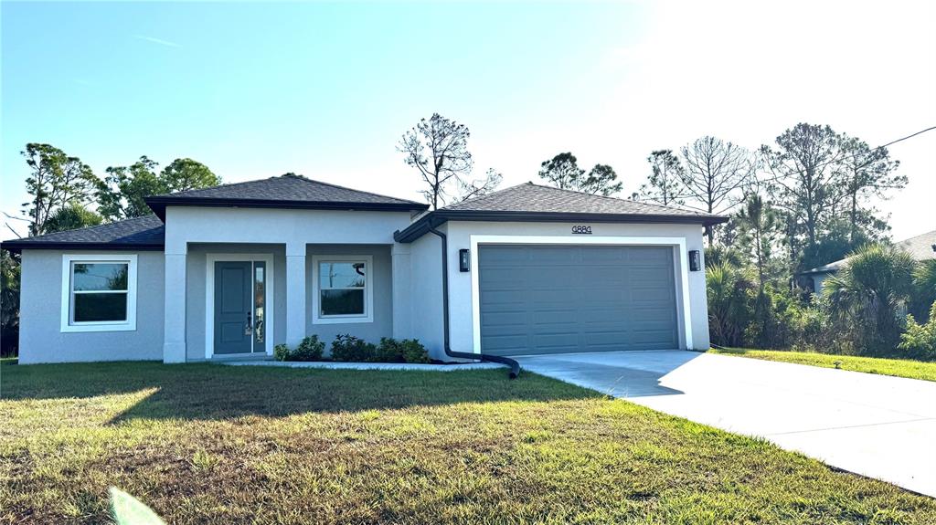 4884 Kisla Rd Port North Port, FL 34288 - Photo 1 of 19 a view of a house with a yard
