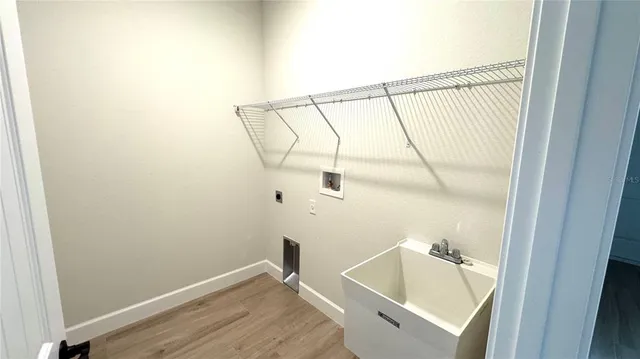 a bathroom with a sink and vanity