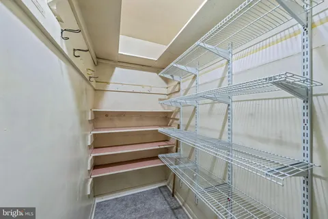 a storage room with a washer and dryer