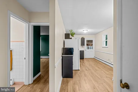 a bathroom with a sink a toilet and a bathtub
