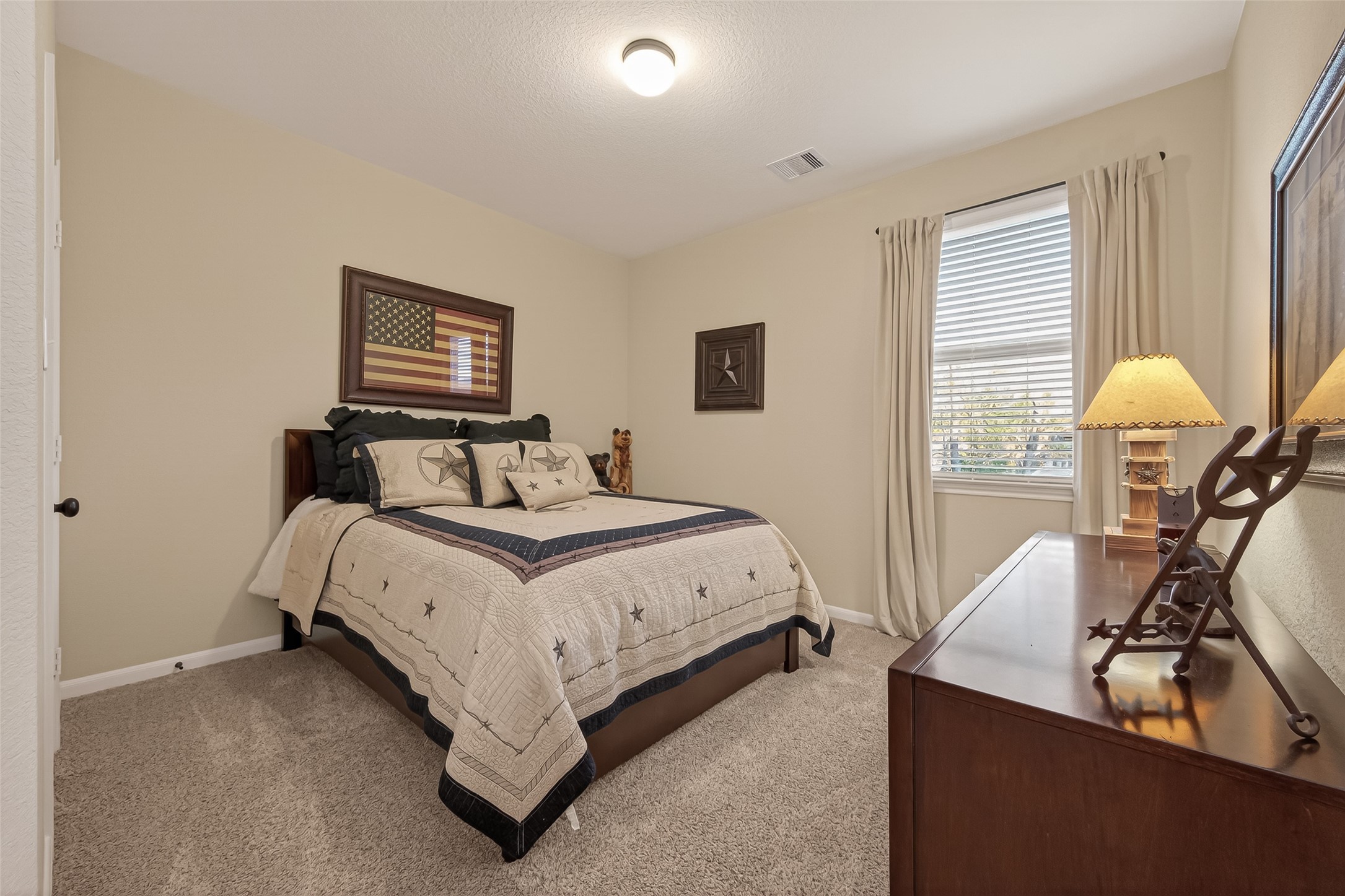 10 Ruchill Circle Conroe, TX 77304 - Photo 29 of 47 Bedroom #4, located upstairs. Spacious, nice closet and bathroom just outside door.