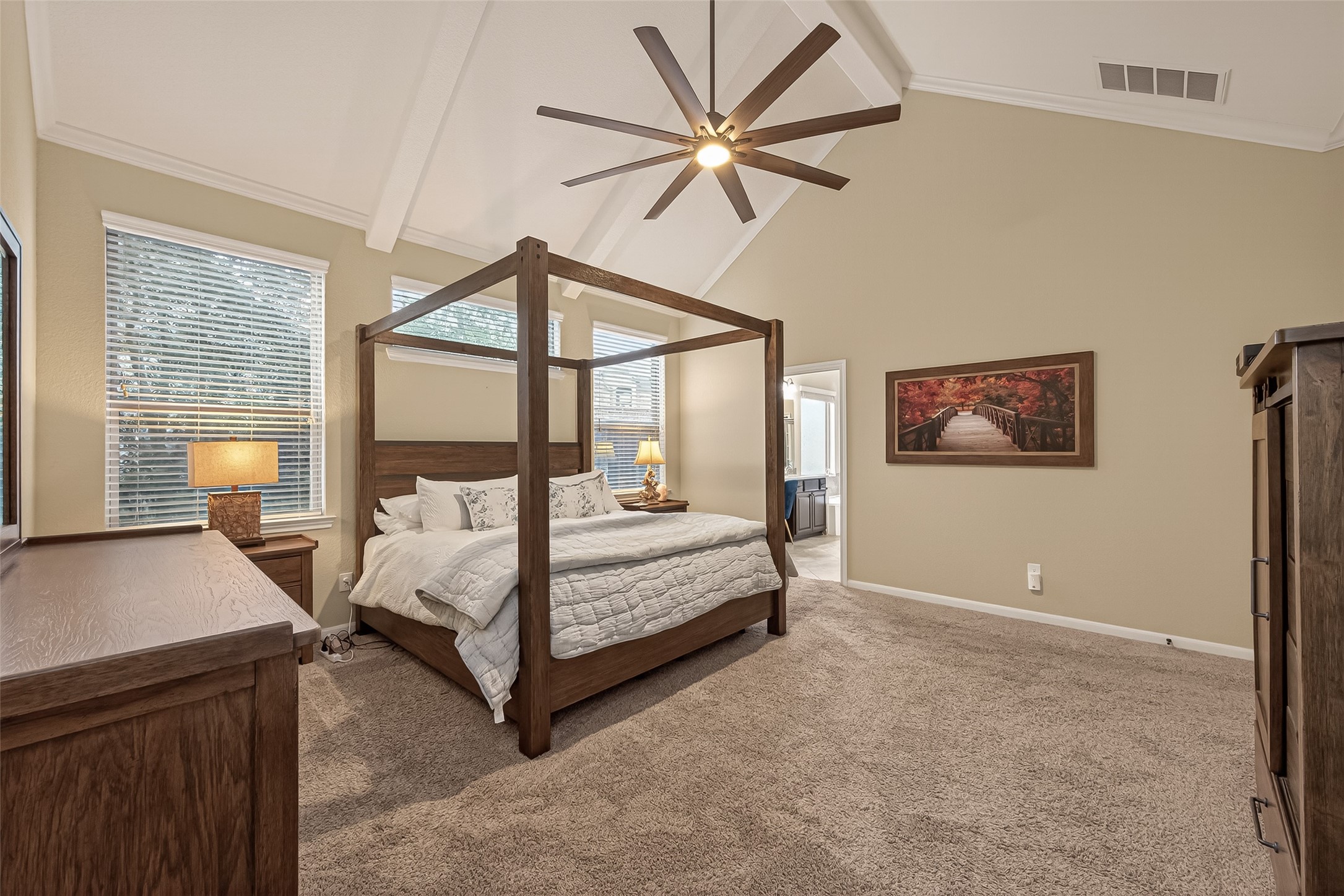 10 Ruchill Circle Conroe, TX 77304 - Photo 32 of 47 You can see how much space in this Primary Room, with windows for natural light. Stunning!