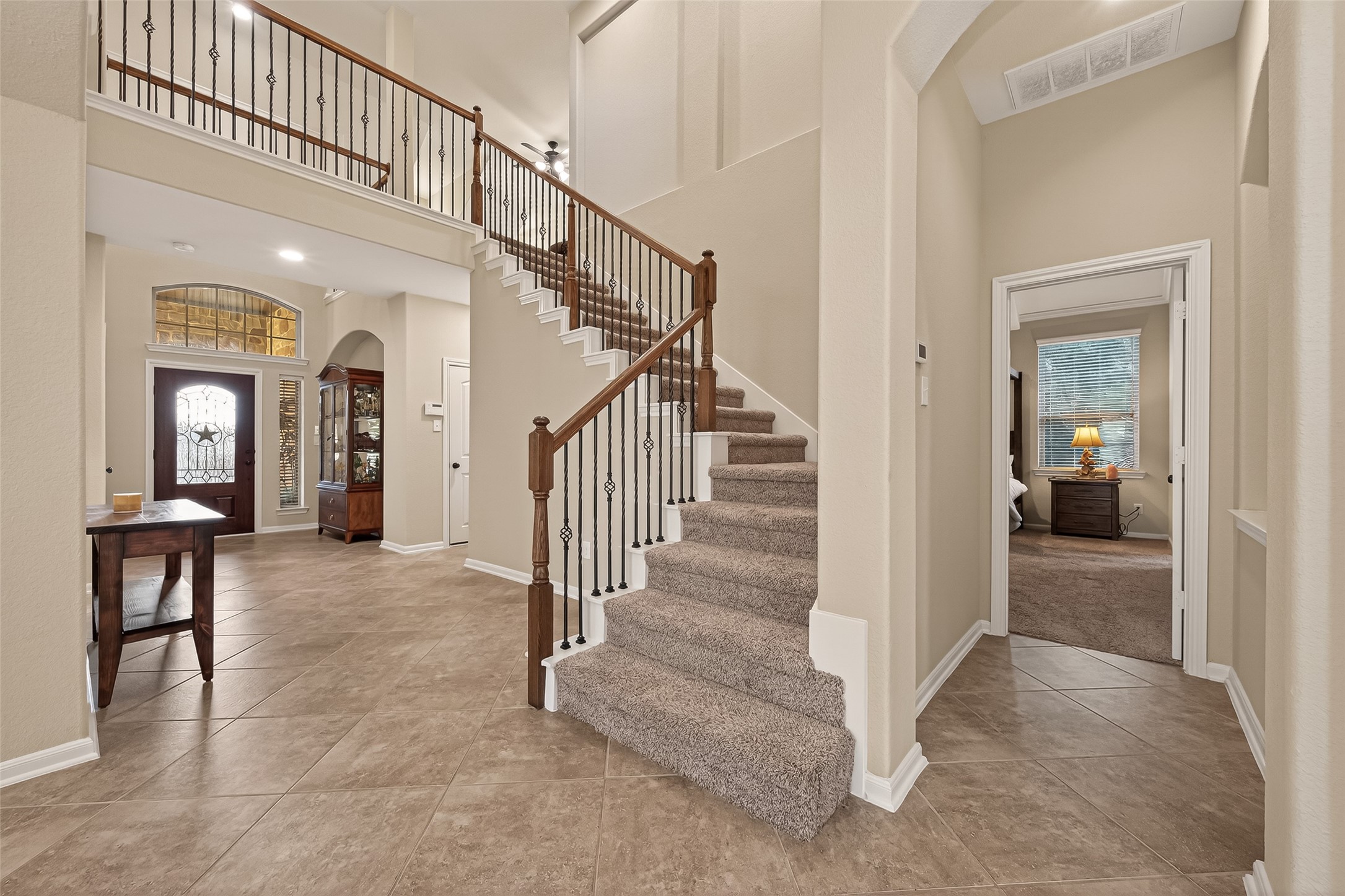 10 Ruchill Circle Conroe, TX 77304 - Photo 8 of 47 Stairs are across from Formal Dining Room.