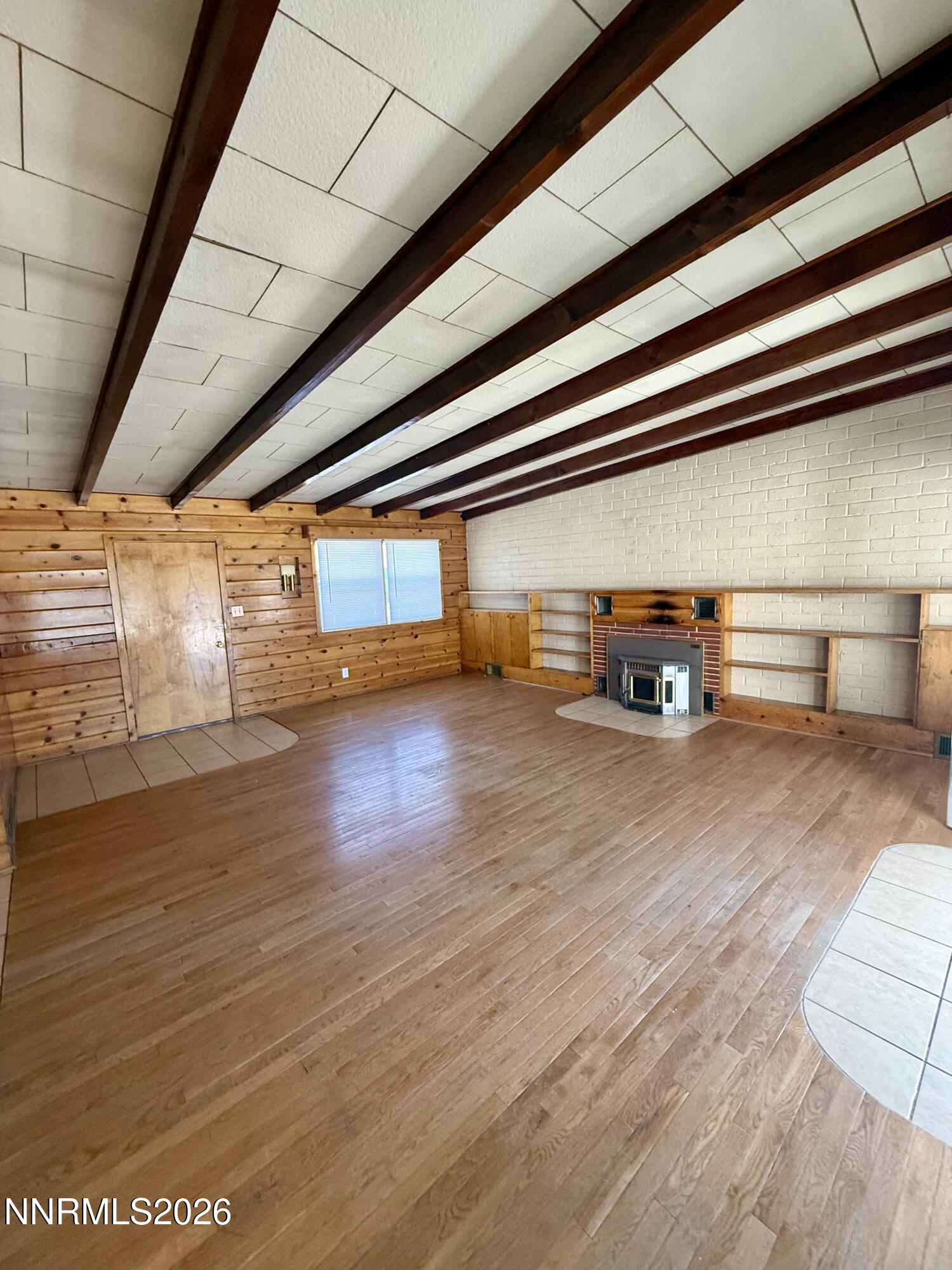745 West Center Street Fallon, NV 89406 - Photo 17 of 31 a view of empty room with wooden floor