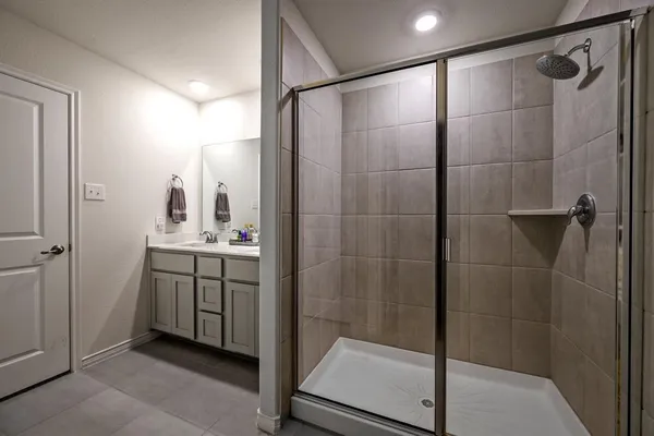 a view of a hallway with washer and dryer