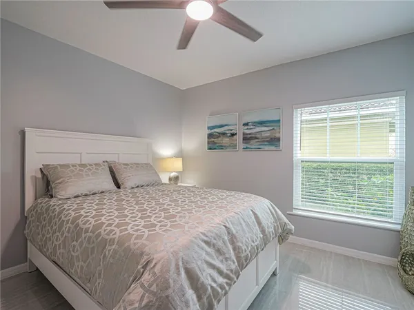 a bedroom with a bed and closet