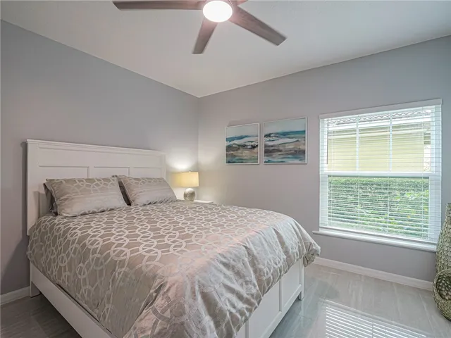 a bedroom with a bed and closet