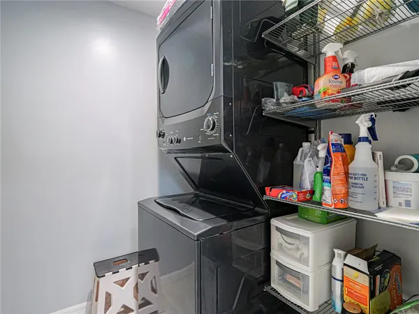 a view of room with a window and sitting area