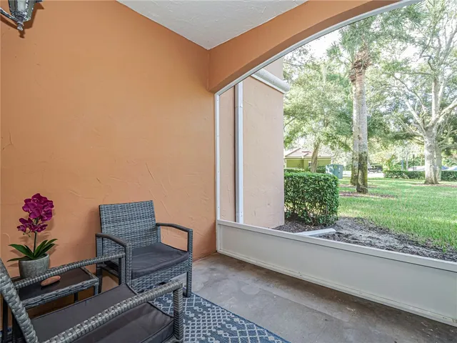 a view of a house with a back yard