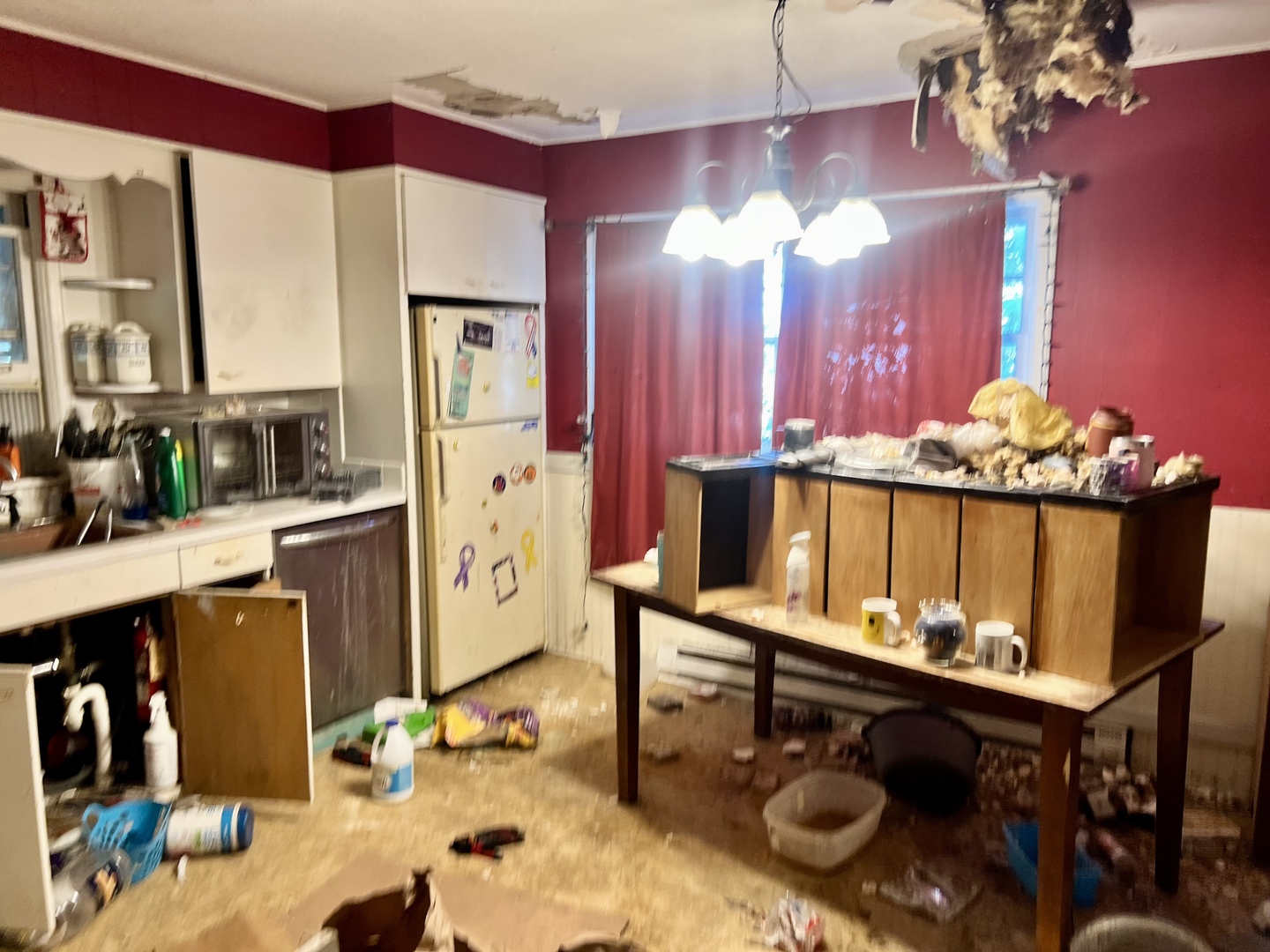 202 Clark Street Sidell, IL 61876 - Photo 6 of 17 a room with chandelier furniture and view of kitchen