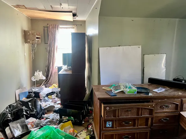 a kitchen with stainless steel appliances a stove and a refrigerator