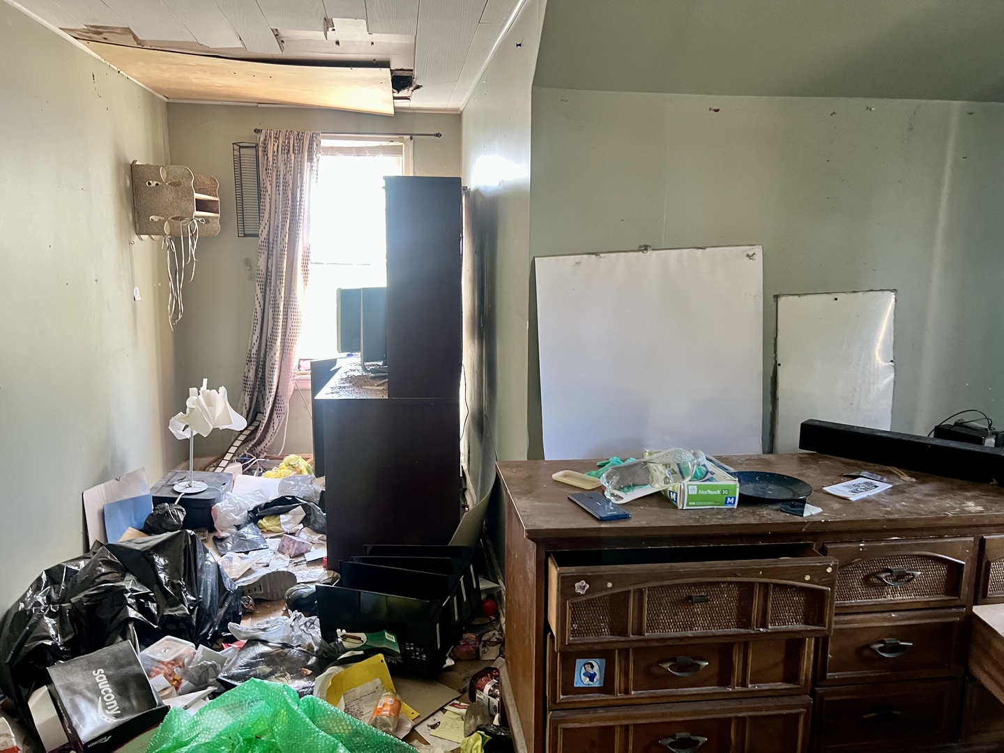 202 Clark Street Sidell, IL 61876 - Photo 10 of 17 a kitchen with stainless steel appliances a stove and a refrigerator