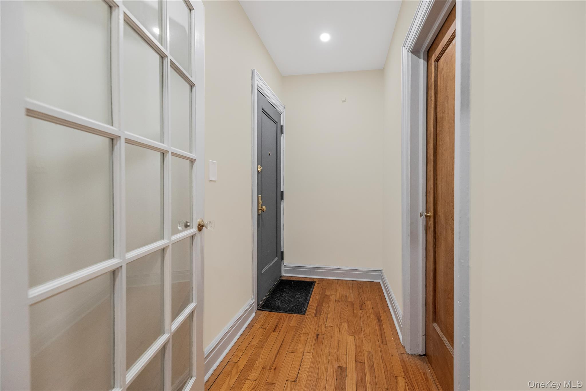 26 Pondfield Road, Unit 1D Bronxville, NY 10708 - Photo 5 of 21 a view of entryway with wooden floor