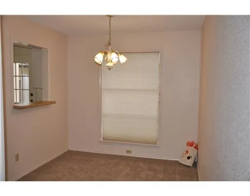 a view of livingroom with chandelier