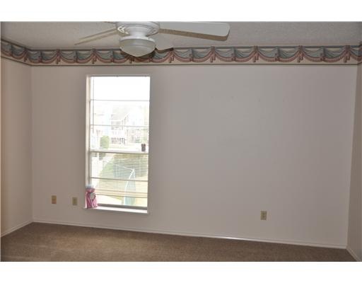 6702 Everhart Road, Unit 104W Corpus Christi, TX 78413 - Photo 8 of 10 a view of a room with rack on the wall and a window