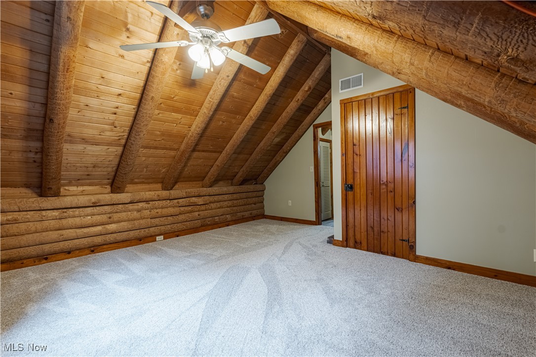 2990 Randolph Road Mogadore, OH 44260 - Photo 22 of 28 Carpeted bedroom with work and storage space.