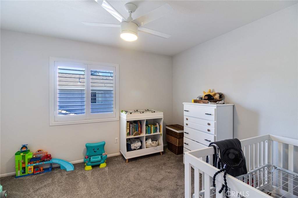 32182 Cala Torrente Temecula, CA 92592 - Photo 20 of 35 a bedroom with furniture and a window