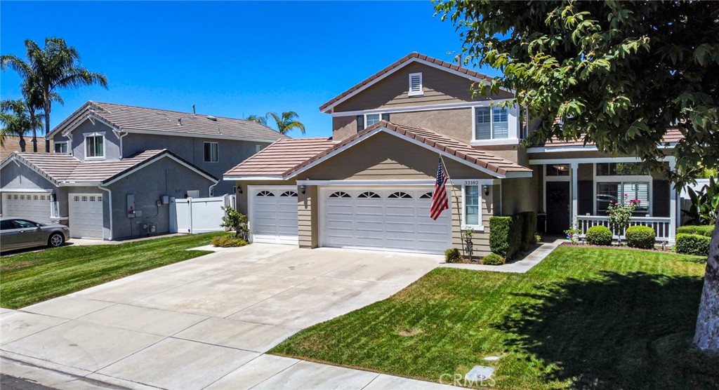 32182 Cala Torrente Temecula, CA 92592 - Photo 2 of 35 a front view of a house with a yard