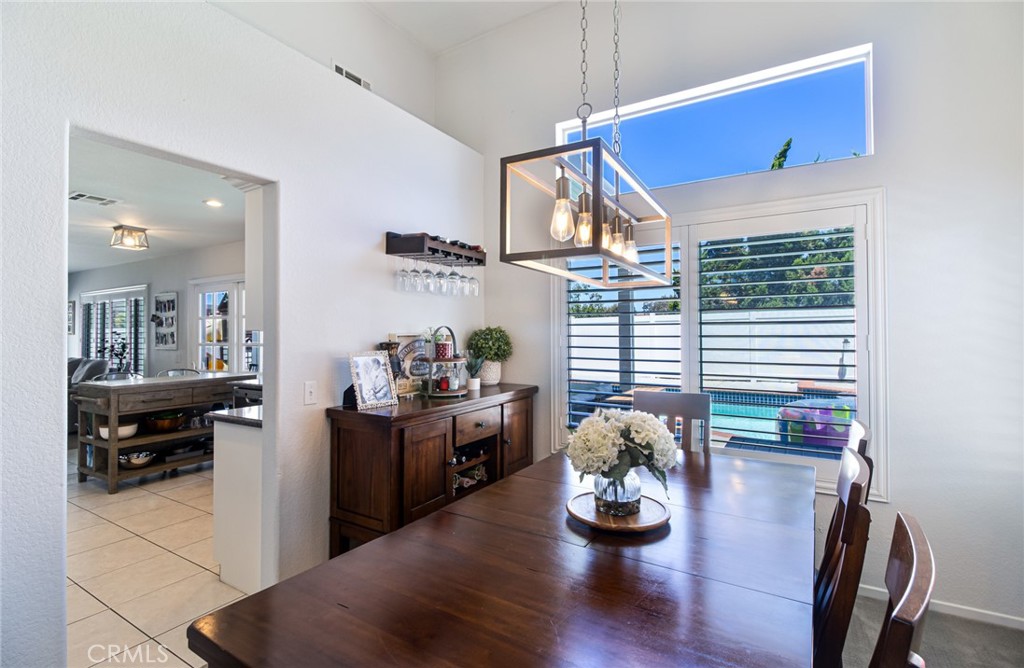 32182 Cala Torrente Temecula, CA 92592 - Photo 6 of 35 a dining room with furniture and wooden floor