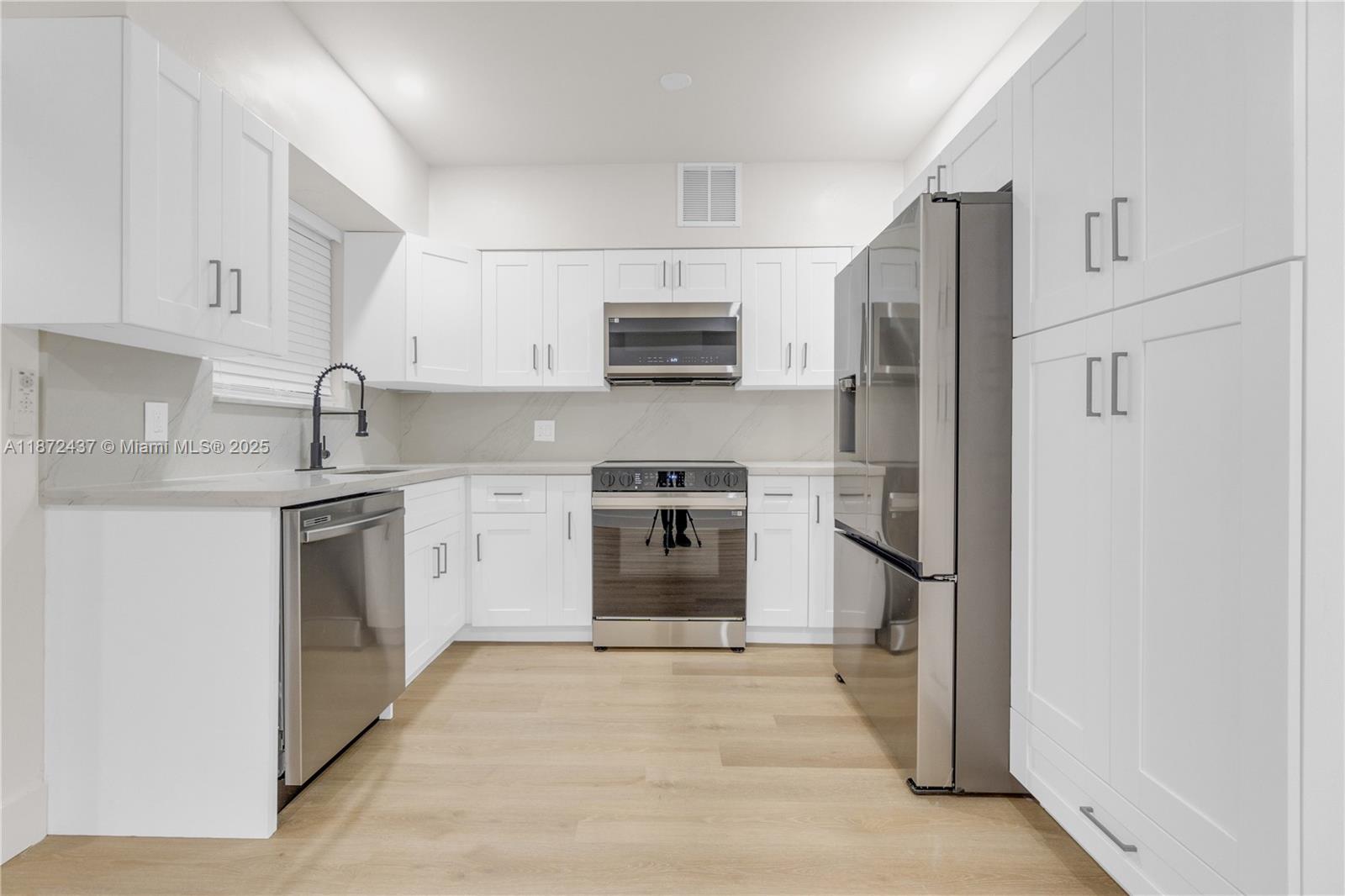 613 Northeast 159th Street Miami, FL 33162 - Photo 3 of 27