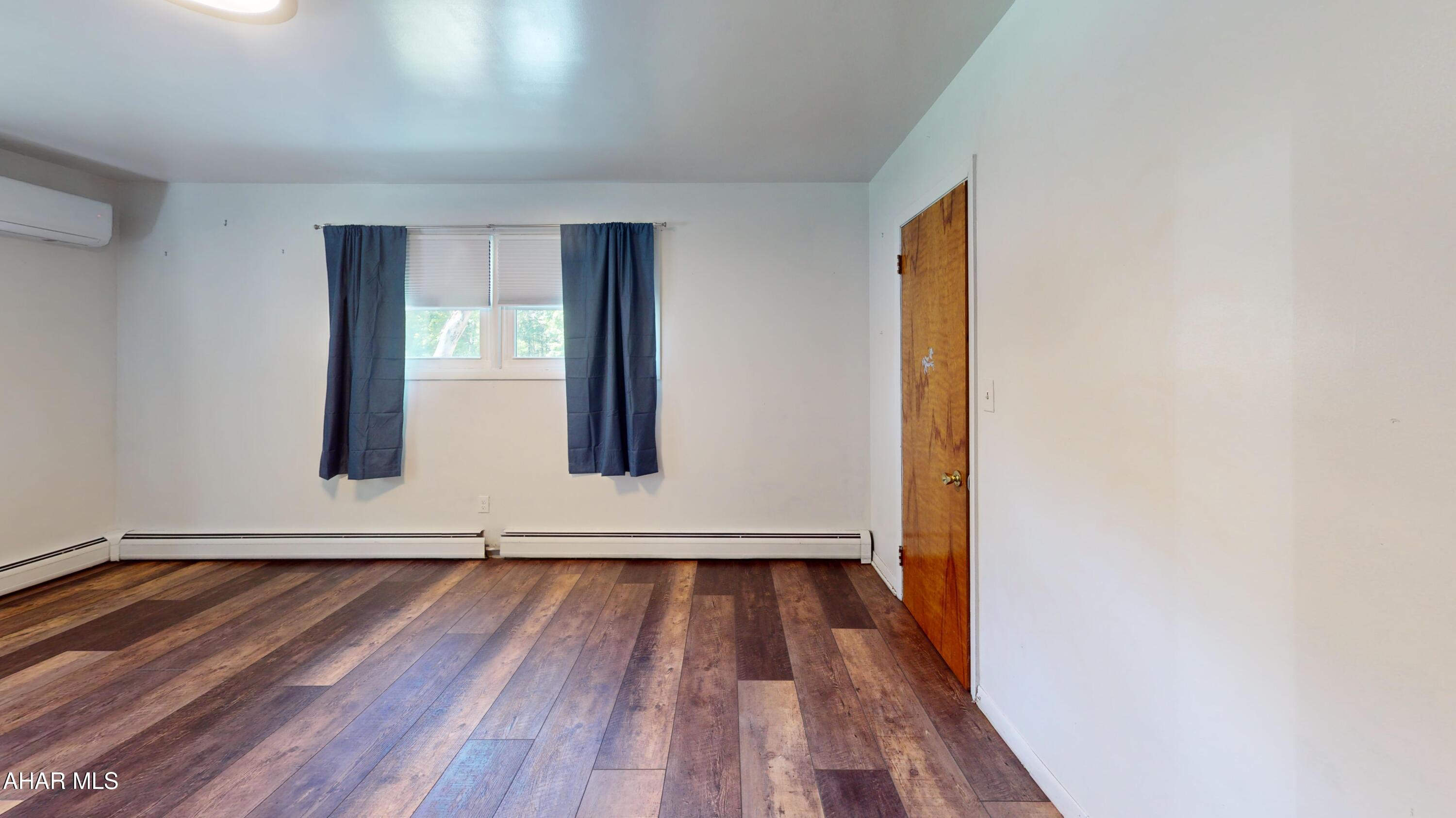 871 Decker Hollow Road Tyrone, PA 16686 - Photo 28 of 35 a view of front door with wooden floor