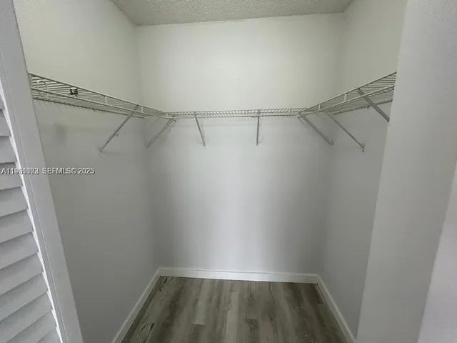 a view of a room with racks on the wall