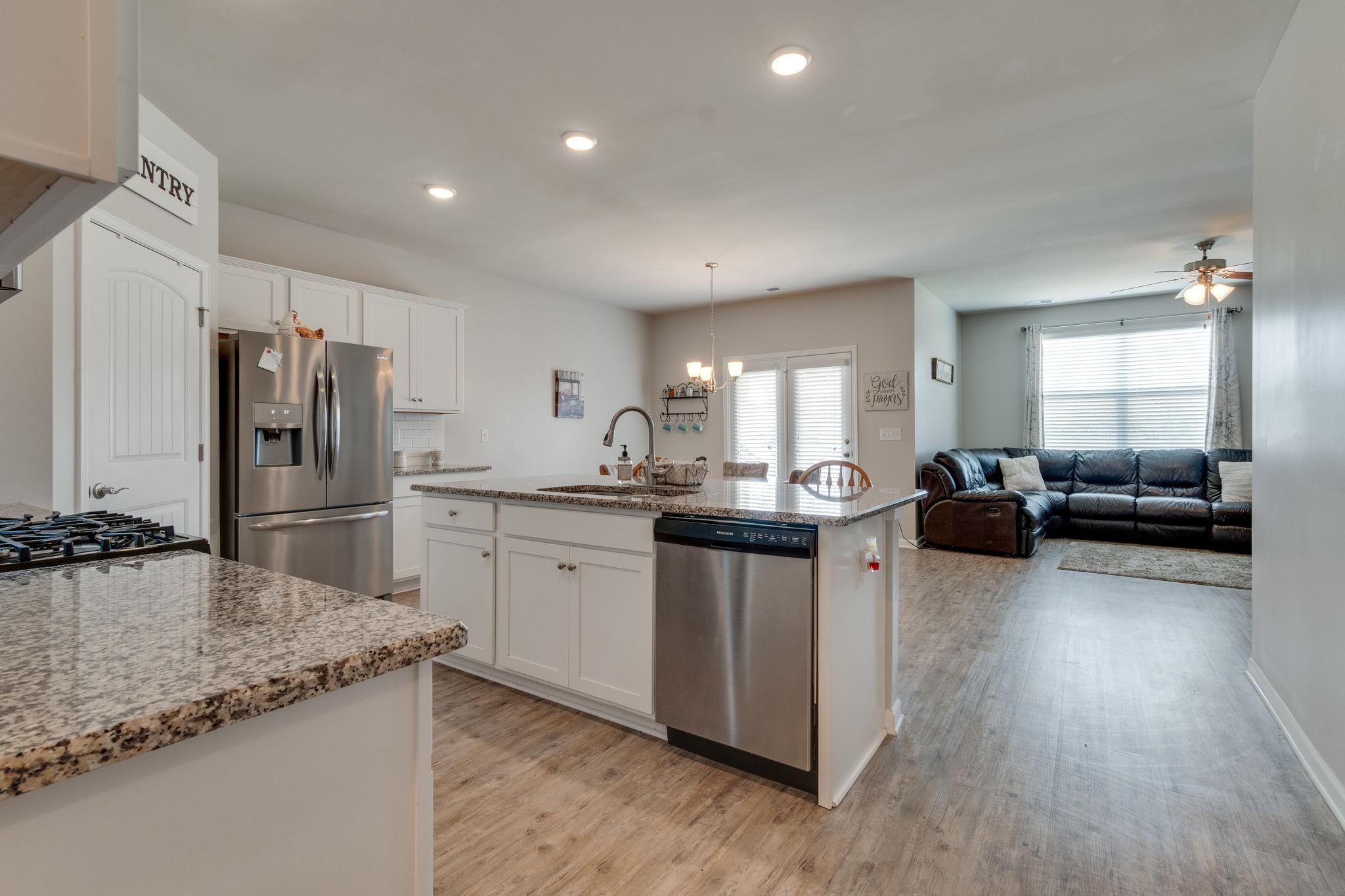 721 Prominence Road, Unit 52 Columbia, TN 38401 - Photo 6 of 27 Kitchen open to dinning and living room