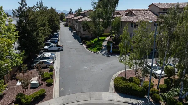 a view of a street with an outdoor space