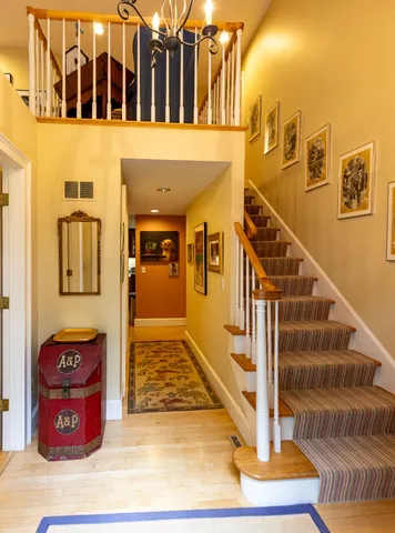 a view of a living room and entryway