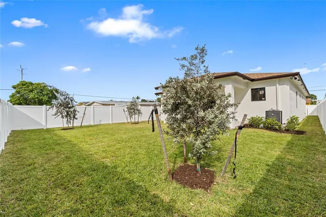 a view of a house with a garden