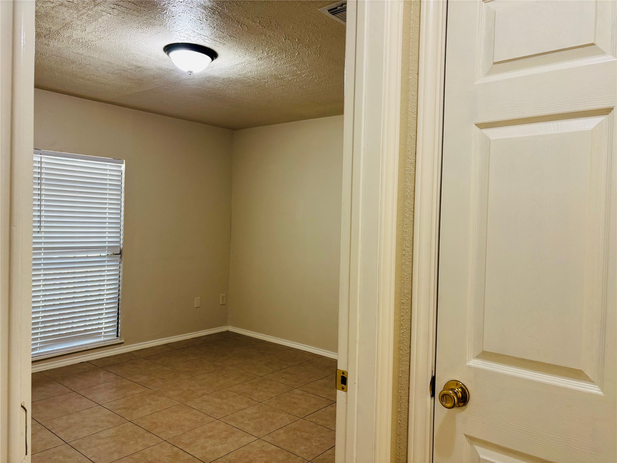 12409 Sharpview Drive, Unit 2409 Houston, TX 77072 - Photo 14 of 21 a view of an empty room