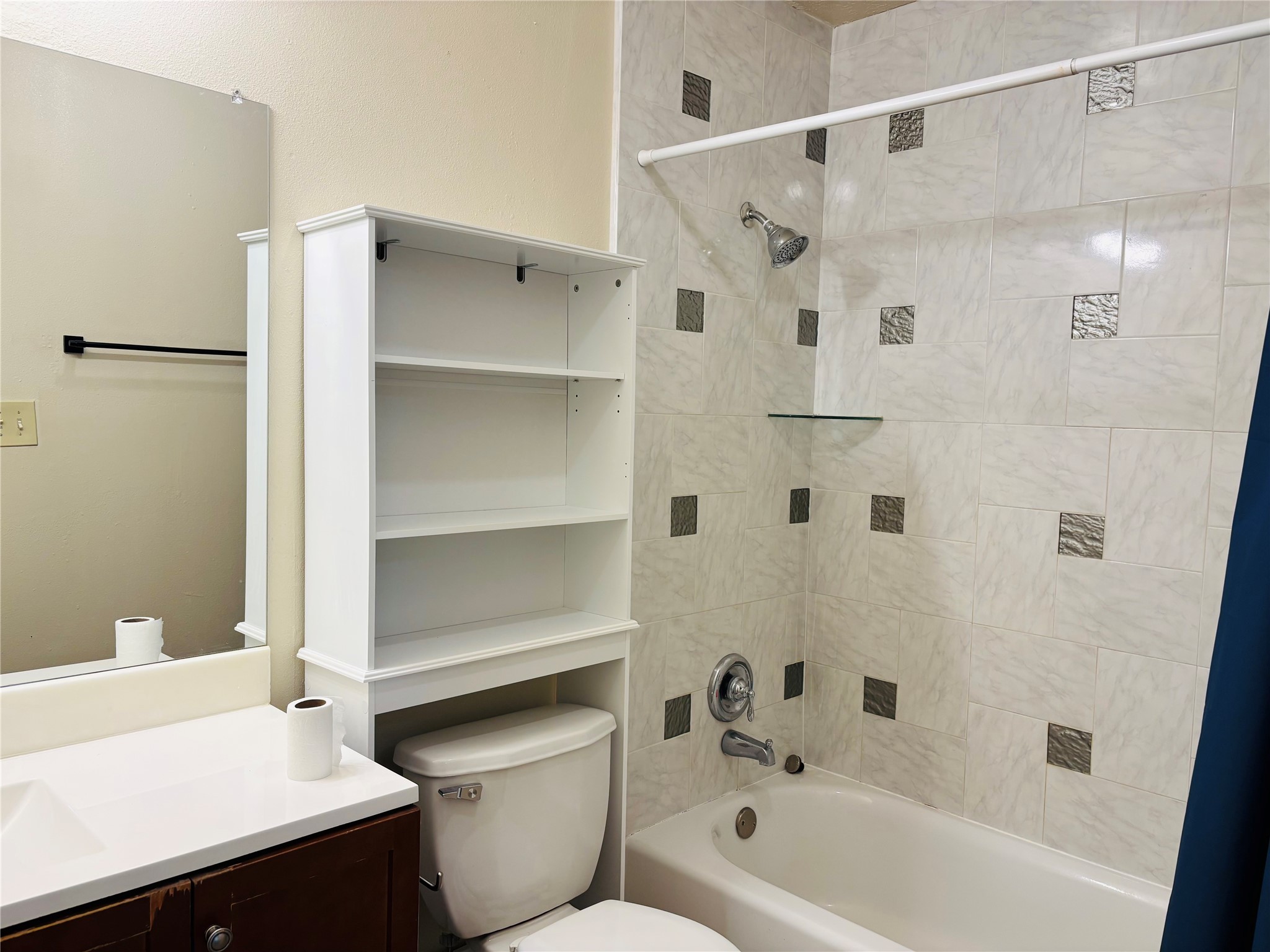 12409 Sharpview Drive, Unit 2409 Houston, TX 77072 - Photo 15 of 21 a bathroom with a bathtub a sink and a shower