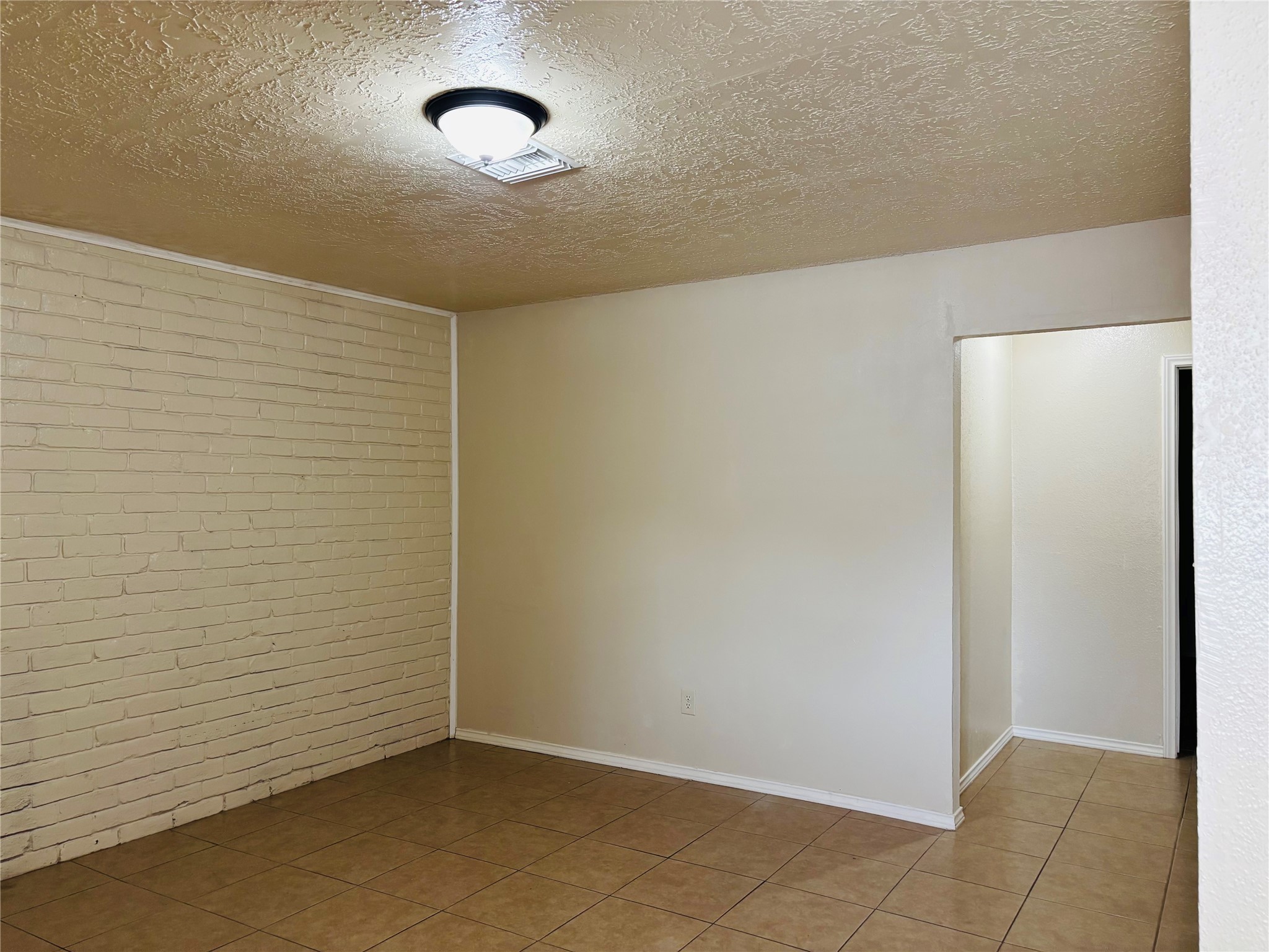 12409 Sharpview Drive, Unit 2409 Houston, TX 77072 - Photo 7 of 21 a view of an empty room