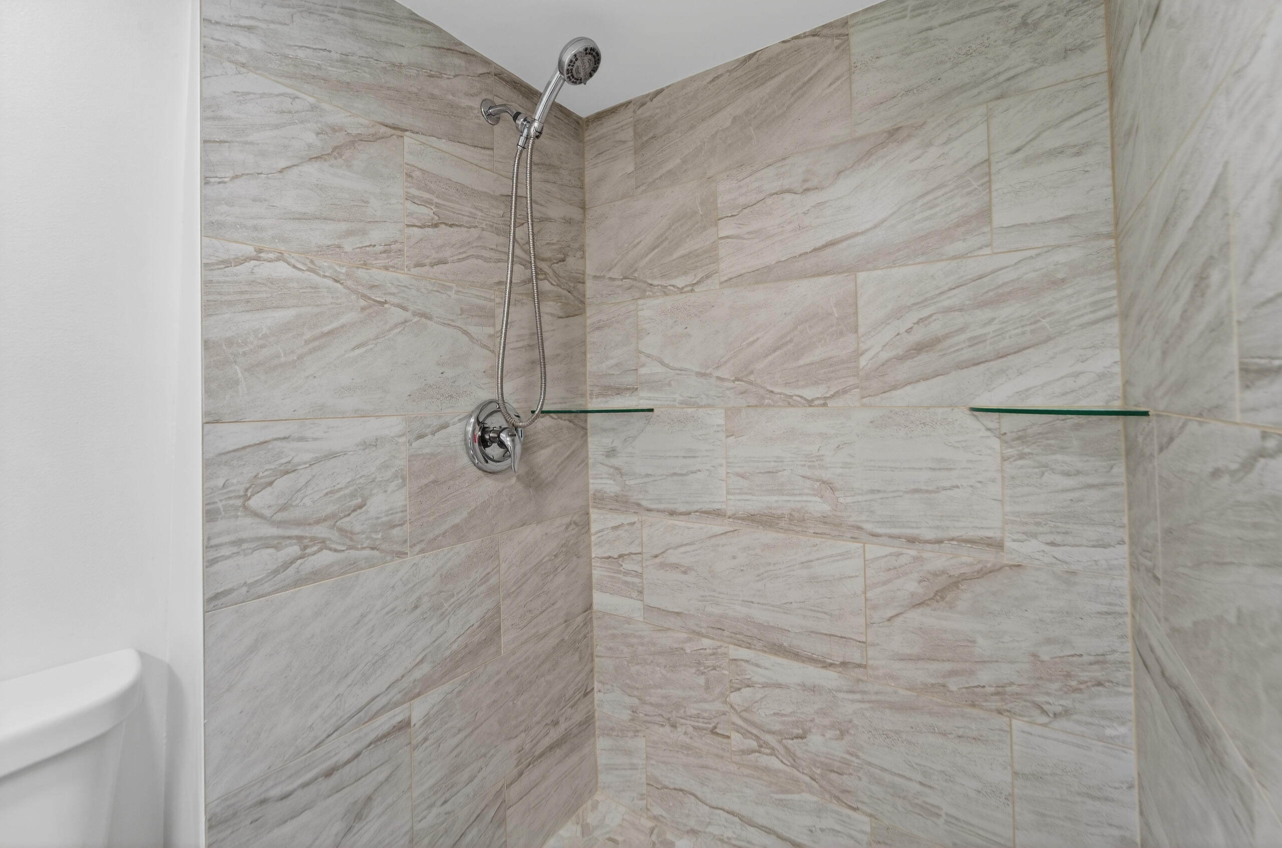 3900 County Line Road, Unit 11D Tequesta, FL 33469 - Photo 21 of 53 a bathroom with a shower