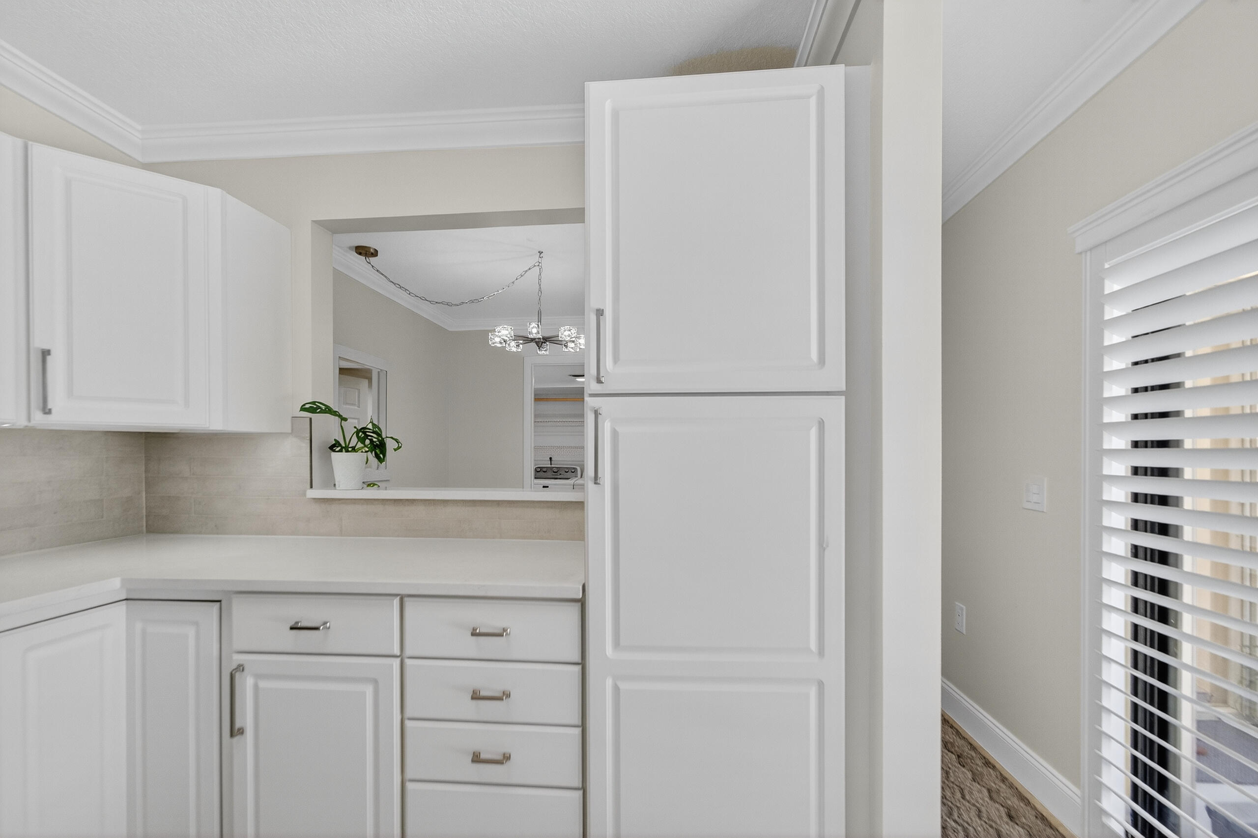 3900 County Line Road, Unit 11D Tequesta, FL 33469 - Photo 3 of 53 a kitchen with appliances and cabinets