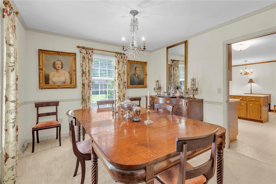 203 Fox Creek Road Anderson, SC 29621 - Photo 7 of 36 This elegant dining room features ample space for entertaining and a bright, inviting atmosphere.