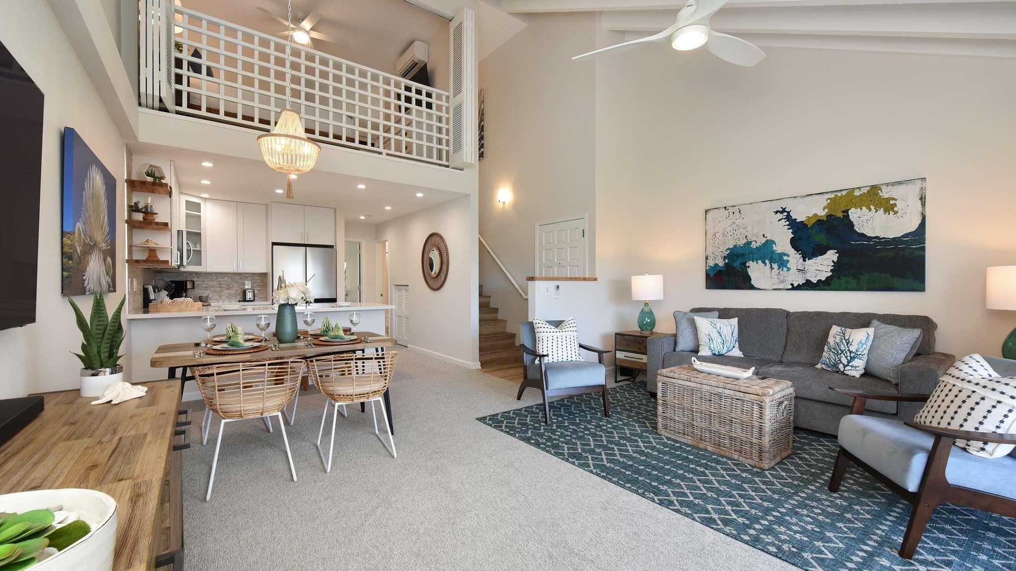 2777 South Kihei Road, Unit E202 Kihei, HI 96753 - Photo 2 of 37 a living room with lots of furniture and a view of kitchen