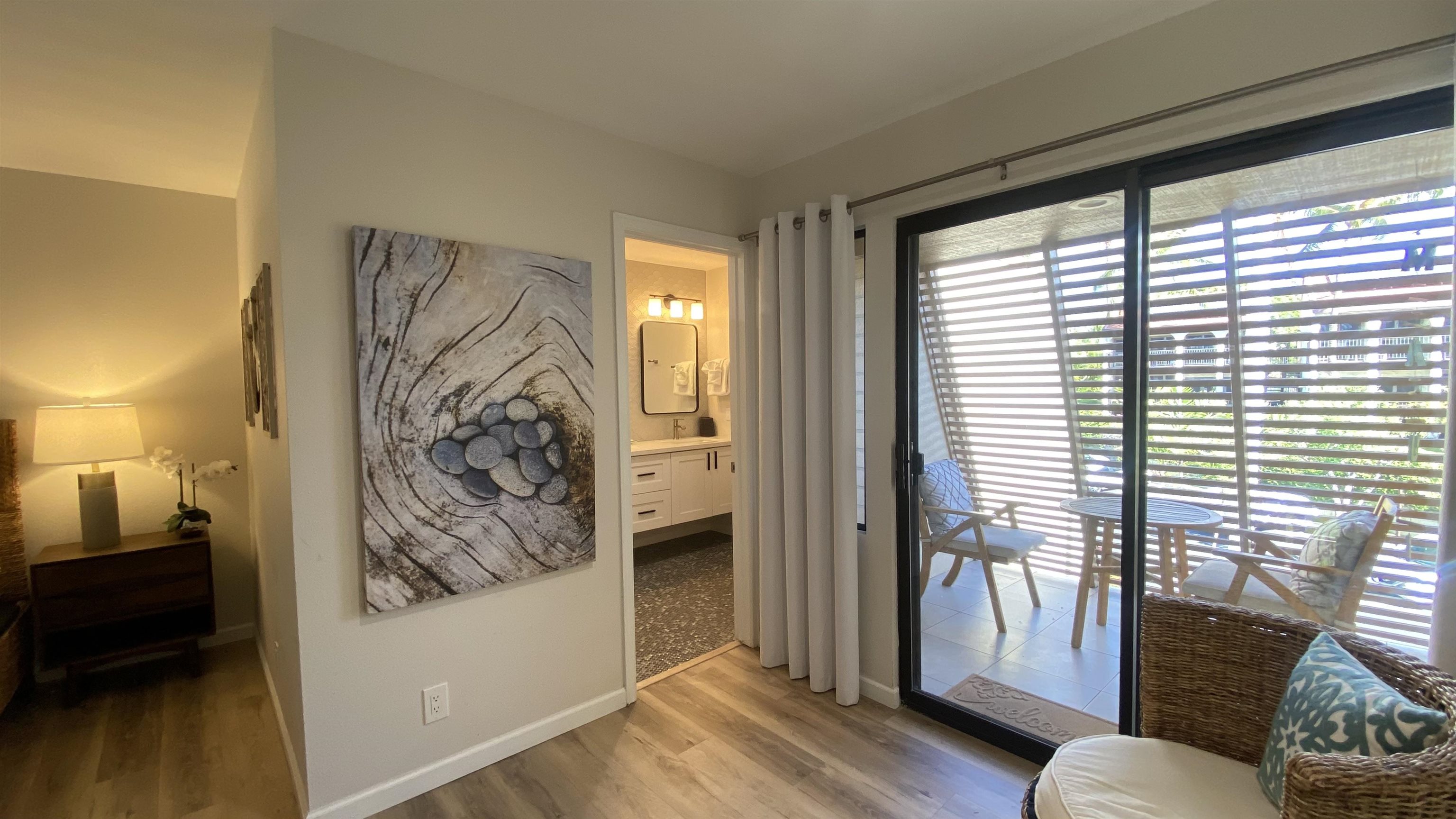 2777 South Kihei Road, Unit E202 Kihei, HI 96753 - Photo 27 of 37 a view of a livingroom with furniture and front door