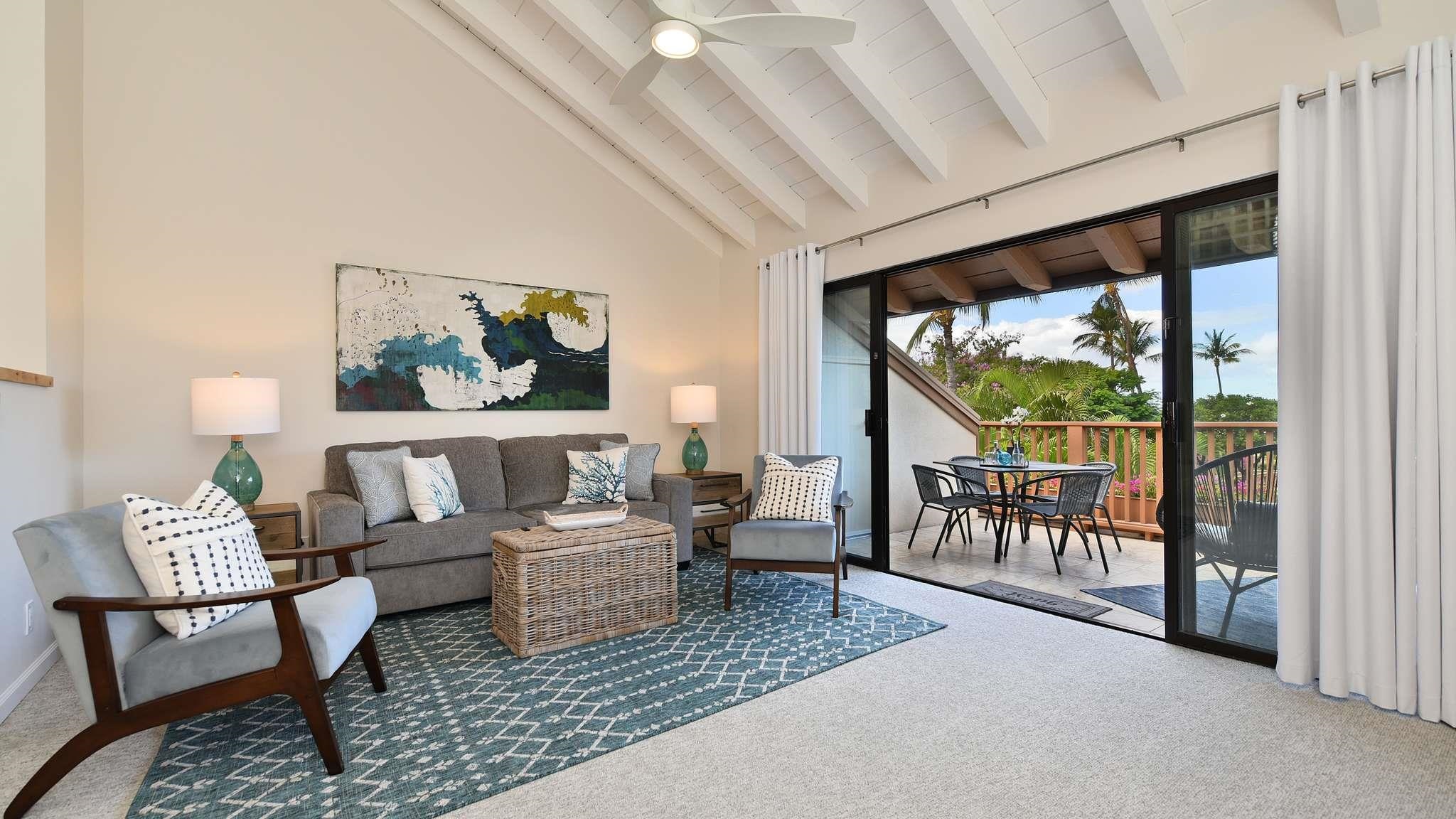 2777 South Kihei Road, Unit E202 Kihei, HI 96753 - Photo 3 of 37 a living room with furniture and a gate