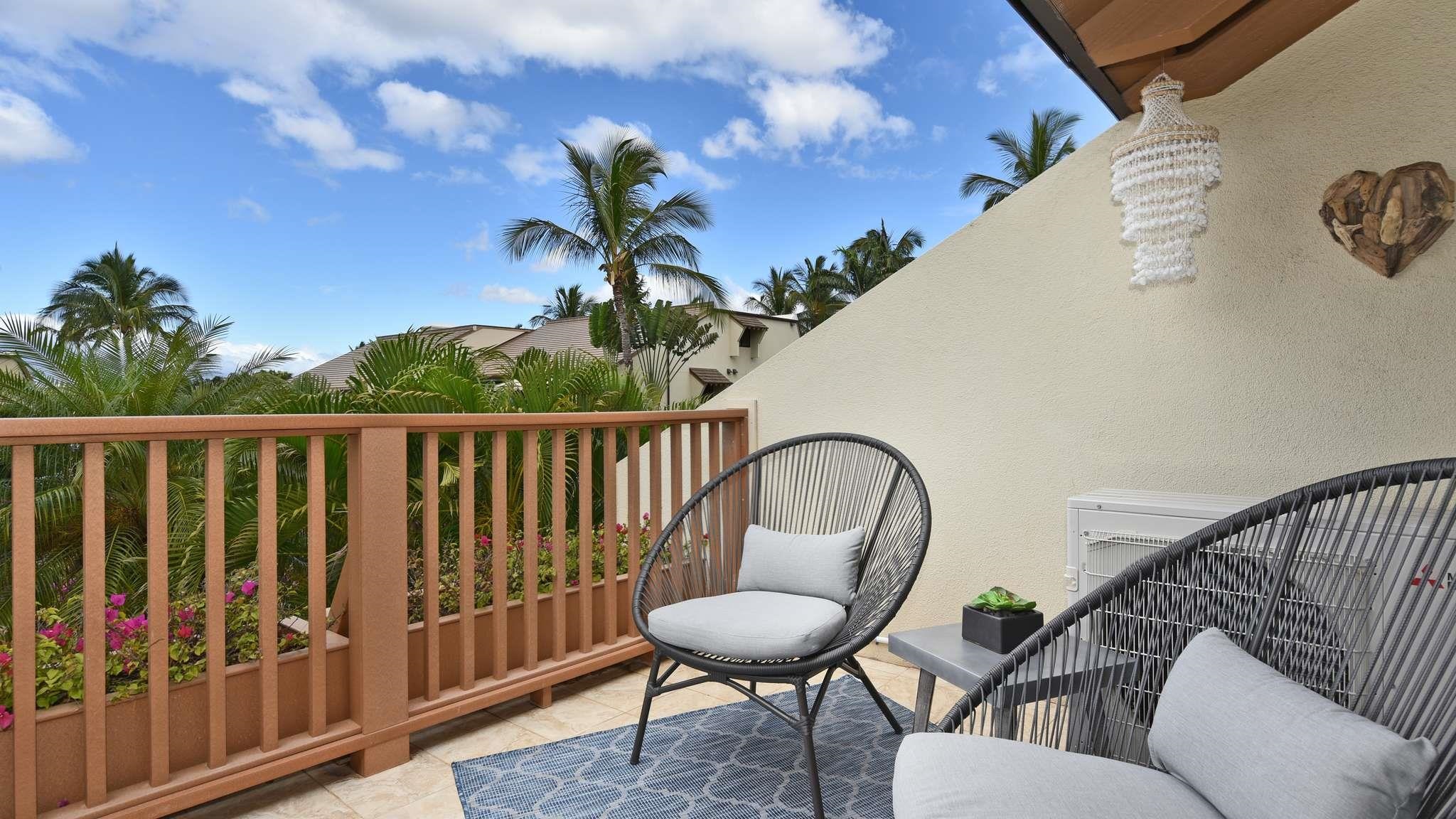 2777 South Kihei Road, Unit E202 Kihei, HI 96753 - Photo 7 of 37 a view of a chairs and table in the balcony