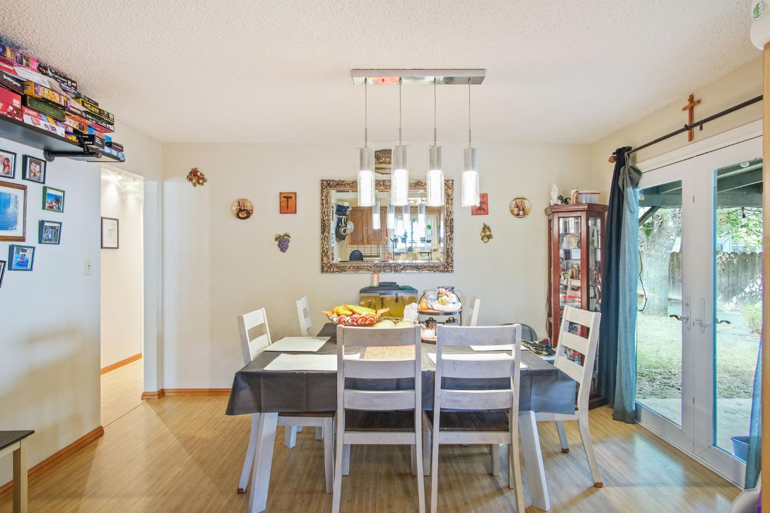 3221 Dublin Avenue Merced, CA 95340 - Photo 12 of 22 a dining room with furniture and wooden floor