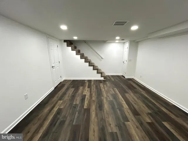 a view of entryway with wooden floor