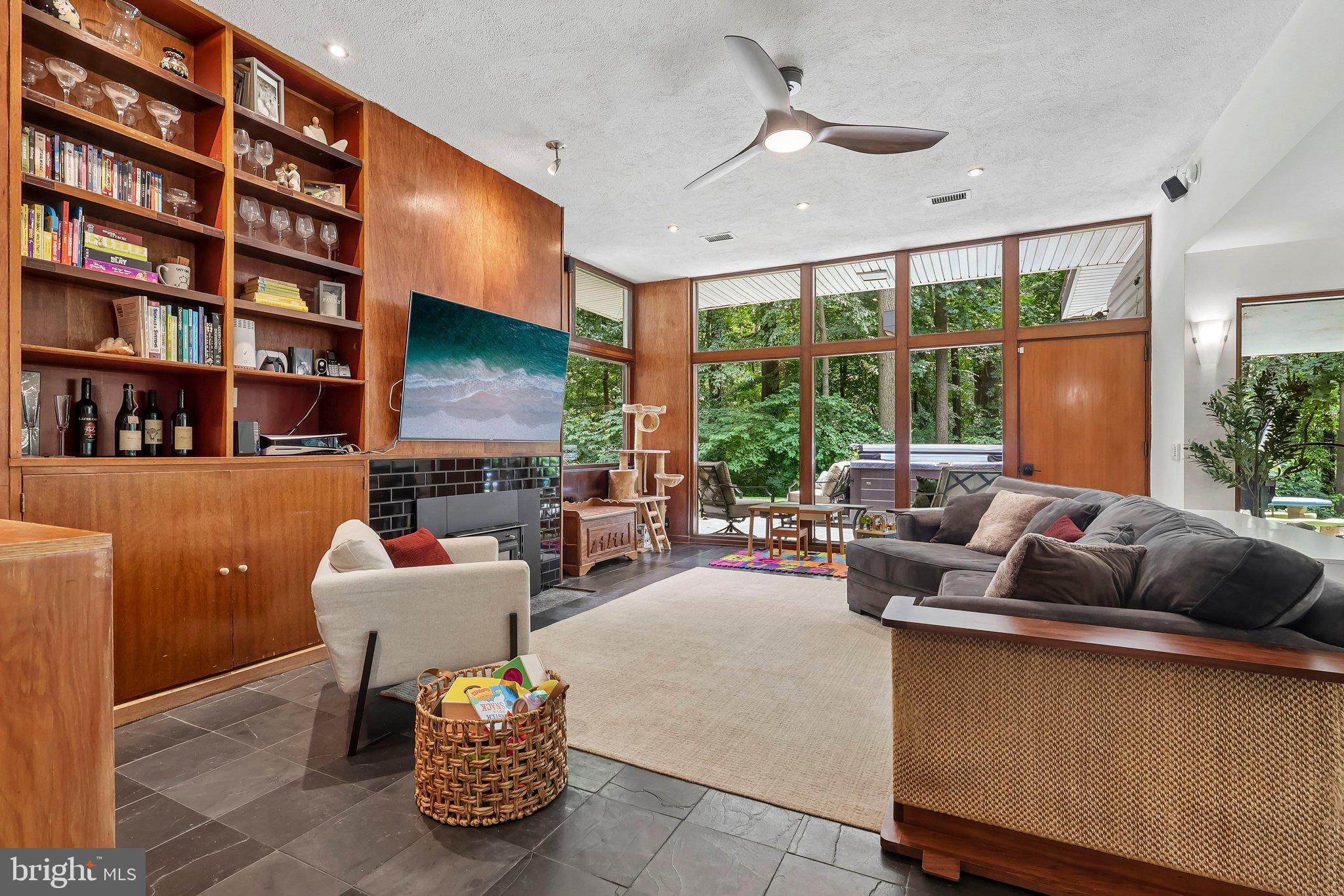 939 North Avenue Springfield, PA 19064 - Photo 6 of 49 Living room floor to ceiling windows