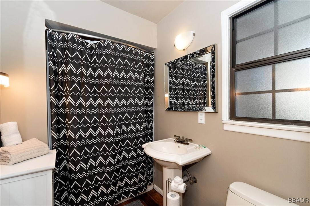 667 Talmadge Road Big Bear Lake, CA 92315 - Photo 25 of 41 a bathroom with a sink and a toilet