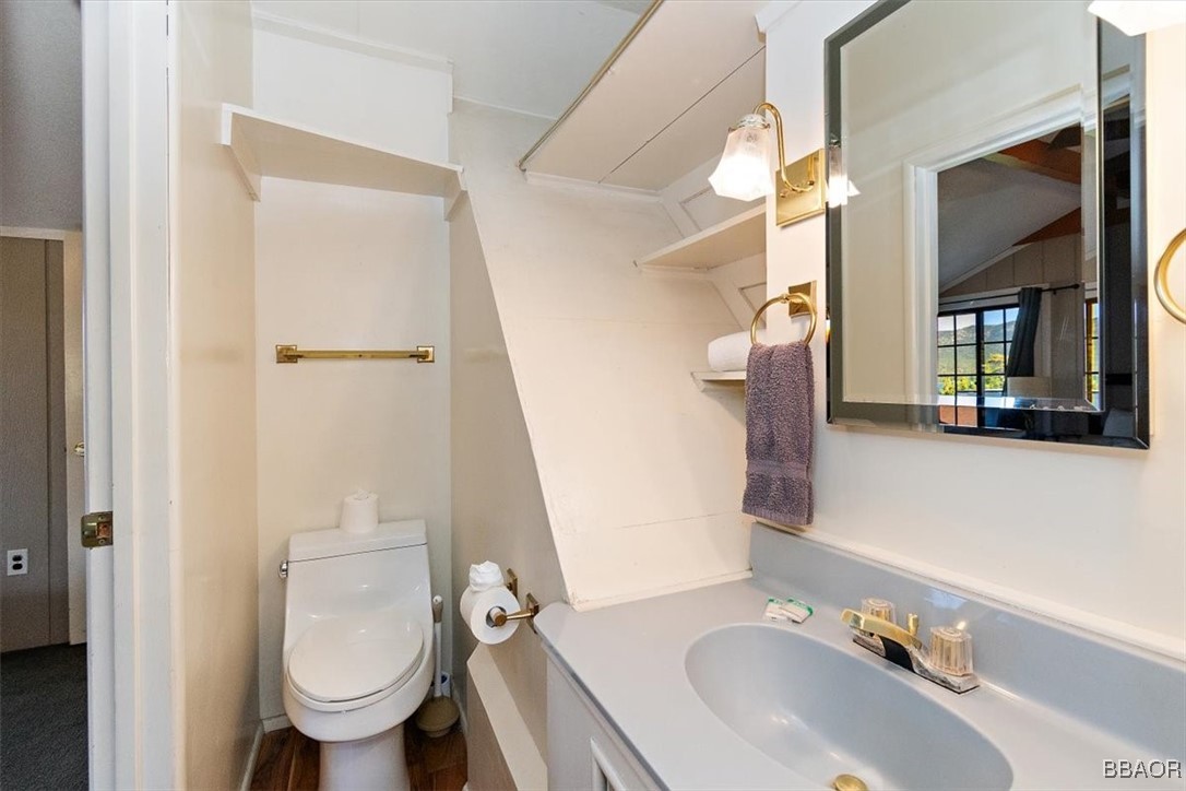 667 Talmadge Road Big Bear Lake, CA 92315 - Photo 36 of 41 a bathroom with a sink toilet and shower