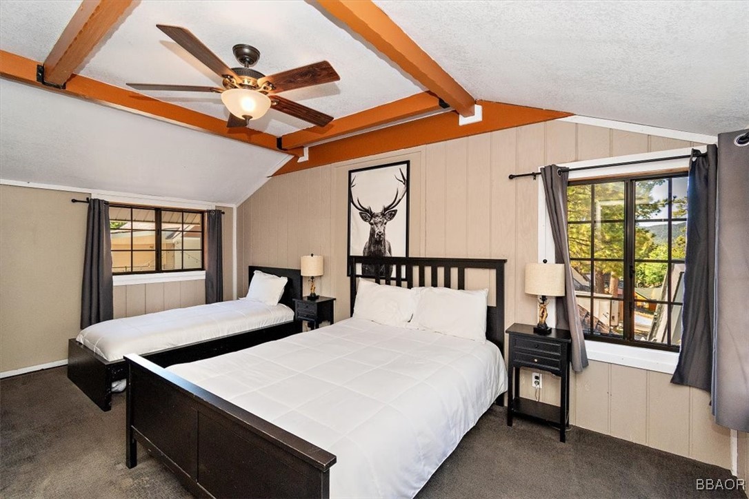 667 Talmadge Road Big Bear Lake, CA 92315 - Photo 37 of 41 a bedroom with a bed and a large window