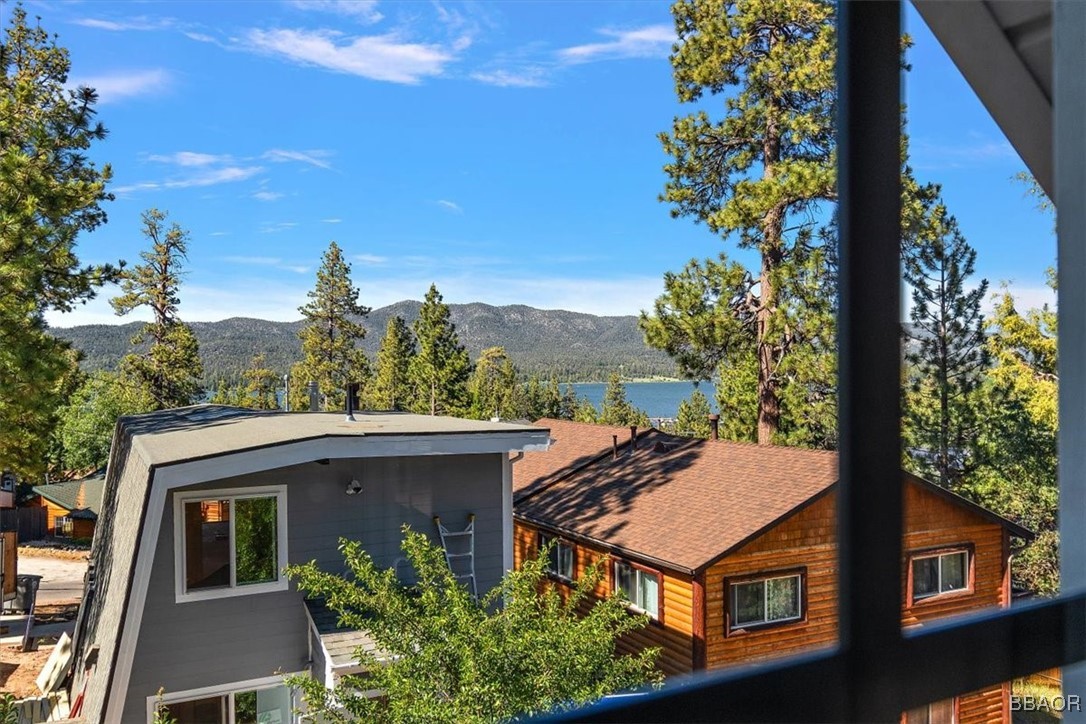 667 Talmadge Road Big Bear Lake, CA 92315 - Photo 39 of 41 a view of a patio with table and chairs and potted plants