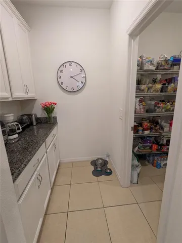 a kitchen with a cabinets and a stove